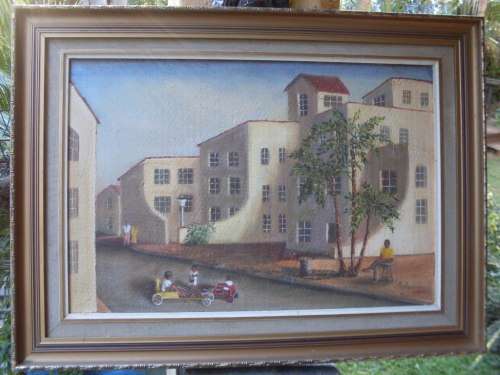 A VERY INTERESTING FRAMED OIL ON BOARD STREET SCENE  WITH A BOY NEGOTIATING FOR A GO CART RIDE