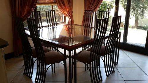 8 Seater dining table and chairs
