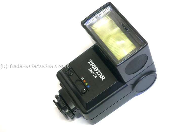 TRISTAR 320TZB Flash will work with canon or nikon