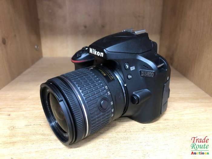 Nikon D3400 24.2 MP CMOS Digital SLR Camera body + Nikon AF-P 18-55 VR Lens Kit