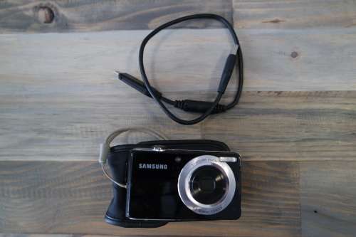 Samsung PL100 12.2MP Digital Camera Dual Screen