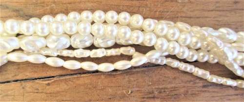 FAUX SEED PEARL  STRING OF BEADS LENGTH WHEN CLOSED 233 MM