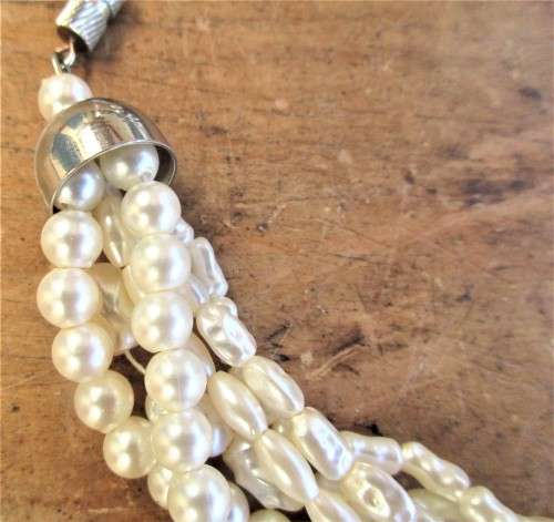FAUX SEED PEARL  STRING OF BEADS LENGTH WHEN CLOSED 233 MM