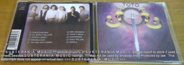 TOTO Toto  includes `Hold the Line`    [Shelf G  X 13]