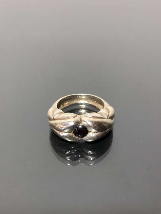 A Solid Silver and Garnet Gemstone Mens Ring