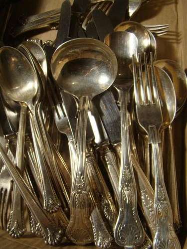 An EPNS CUTLERY SET, by Cooper Bros., comprising 7 Table Knives, 5 Table Forks, 7 Dessert Knives, 6