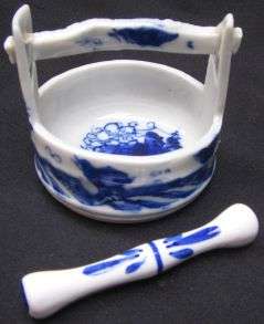 BLUE AND WHITE CERAMIC ORNAMENT