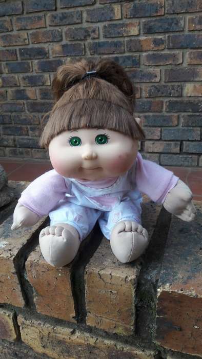 Original signed vintage 2012 Cabbage Patch doll with original clothing. 40cm High.