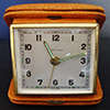 ESTYMA VINTAGE WIND UP TRAVEL ALARM CLOCK IN LEATHER CASE MADE IN GERMANY - WORKING CONDITION