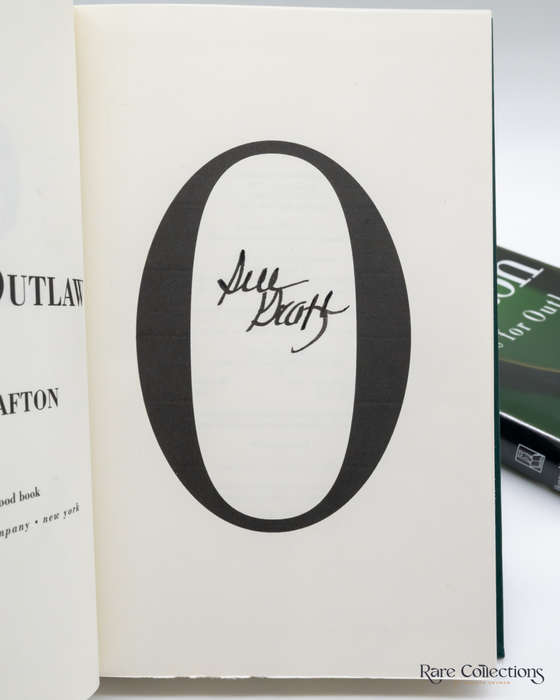 O is for Outlaw by Sue Grafton - signed