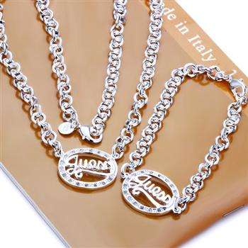 Designer's Guess Egg-Shaped Silver Bracelet and Necklace Set