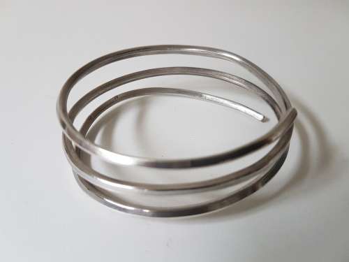 NEW Sterling Silver Coil Bracelet 3 Layered. Hallmarked 925 NEW. 45.8 grammes. Hand made. Not wire.