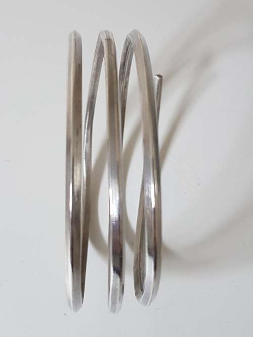 NEW Sterling Silver Coil Bracelet 3 Layered. Hallmarked 925 NEW. 45.8 grammes. Hand made. Not wire.