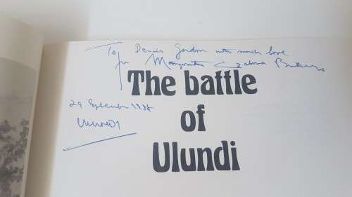 The battle of Ulundi. Signed and inscribed by Zulu Chief Gatsha Buthelezi. By J. Laband.