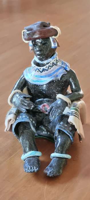 Ceramic figurine Xhosa Youth by Elizabeth Rowland.
