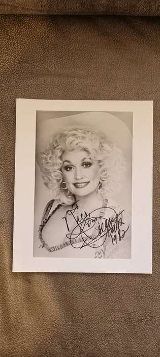 SIGNED AND INSCRIBED DOLLY PARTON PHOTO with Rare Sun City Program from 1982.