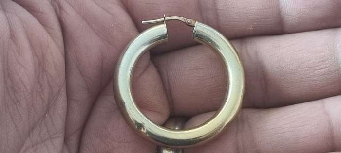 ITALY 925 marked sterling silver 3.6 gram large LARGE SINGLE hoop earring. 4 dents. Gold plated.