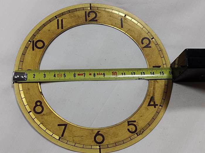 Gold tone clock dial