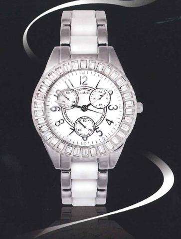 Gorgeous ladies round silver tone watch with crystal bezel and white inlay on strap