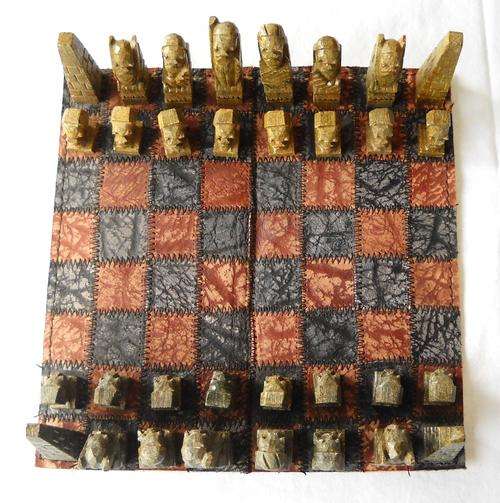 HAND CARVED LIMESTONE CHESS SET-ON LEATHER CHESS BOARD-AFRICAN ETHNIC ART-EXCELLENT CONDITION