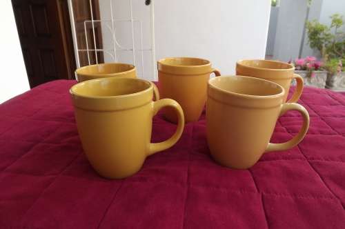 Set of 5 large mustard colour coffee mugs by GIBSON stone ware.Used but in good condition