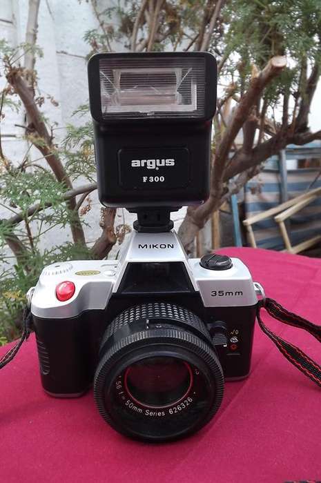 Mikon 35mm Camera - 50mm Lens - looking good but not tested - Argus F300 Flash included