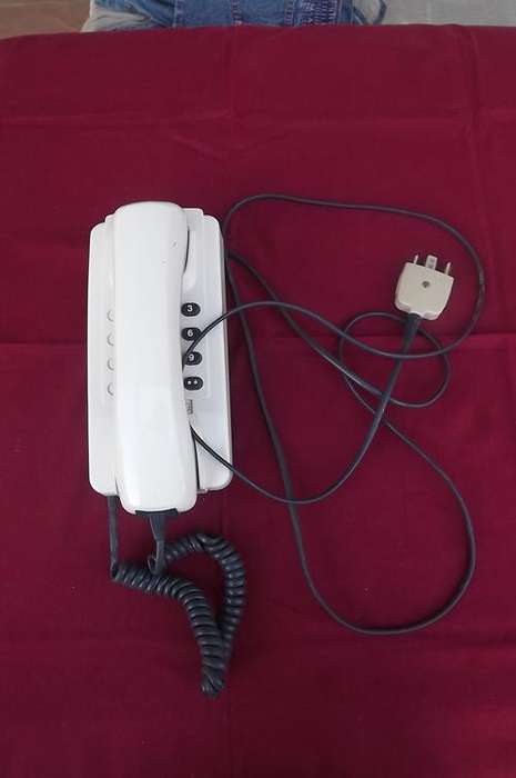 Beige colour push button telephone.Good exterior condition