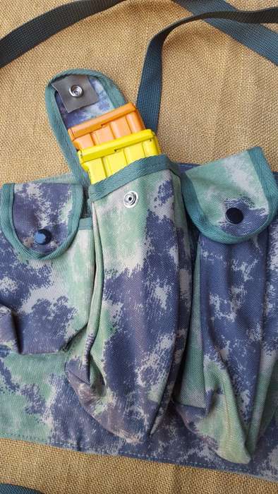 on auction a new custom made Zim splotch camo in nylon chest webbing sized for 6 AK 47 or R4/5 mags