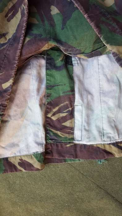 a used good condition UK moD temprate DPM Arctic smock in cotton and large size Falklands era used i