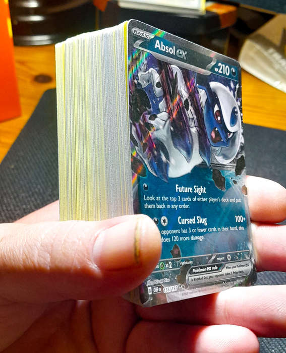 100+ random Pokemon Trading Cards (Includes Shiny Cards)