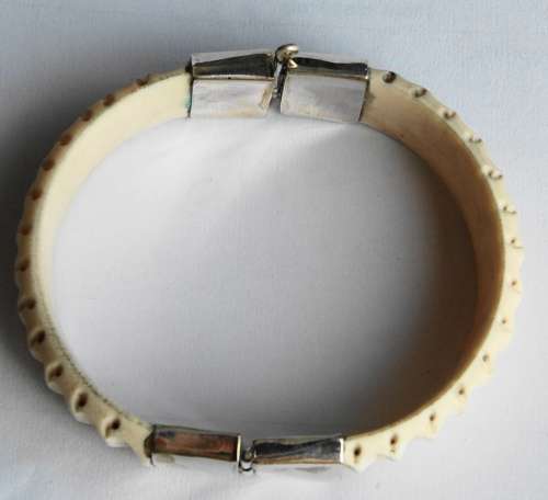 CARVED BONE AND SILVER BANGLE
