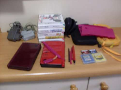 2 X NINTENDO DS CONSOLES 4 STYLUS PENS 1 GAME POUCH 2 CHARGERS 9 GAMES 3 POUCHES