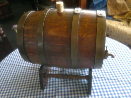 Awesome Oak wine barrel with brass spigot on stand. Ideal to use or display. In good condition.