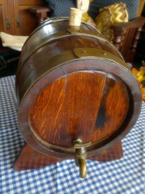 Awesome Oak wine barrel with brass spigot on stand. Ideal to use or display. In good condition.