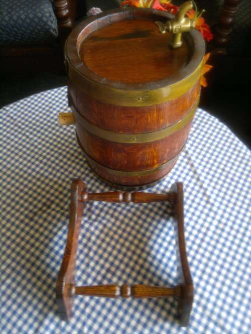 Awesome Oak wine barrel with brass spigot on stand. Ideal to use or display. In good condition.