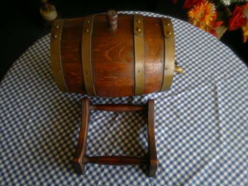 Awesome Oak wine barrel with brass spigot on stand. Ideal to use or display. In good condition.