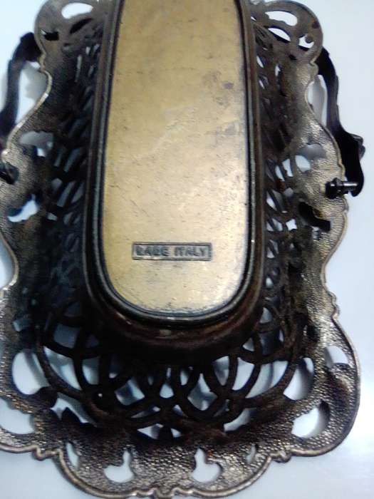 A Vintage Bronze trinket dish with handle + fretwork and filigree stamped made in `Italy`.