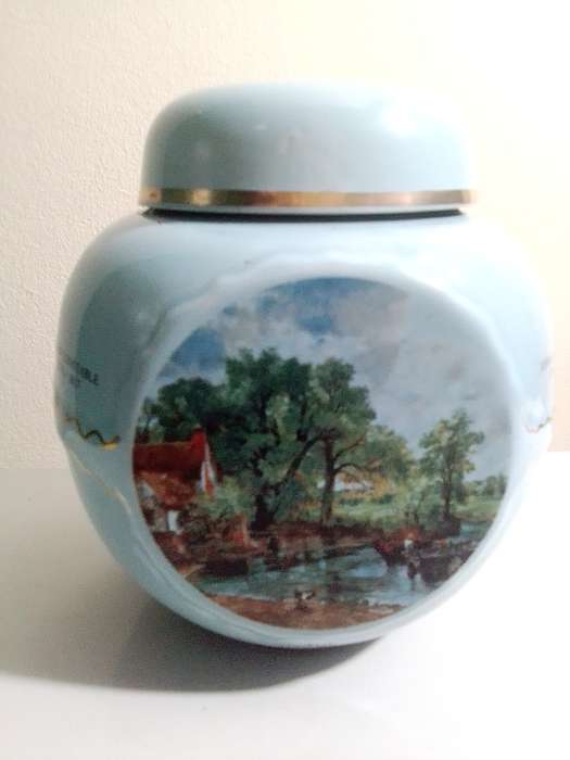 A Twinings Tea lidded canister + wood box with 3 partitions/clasp filled with 15 Cookie cutters.