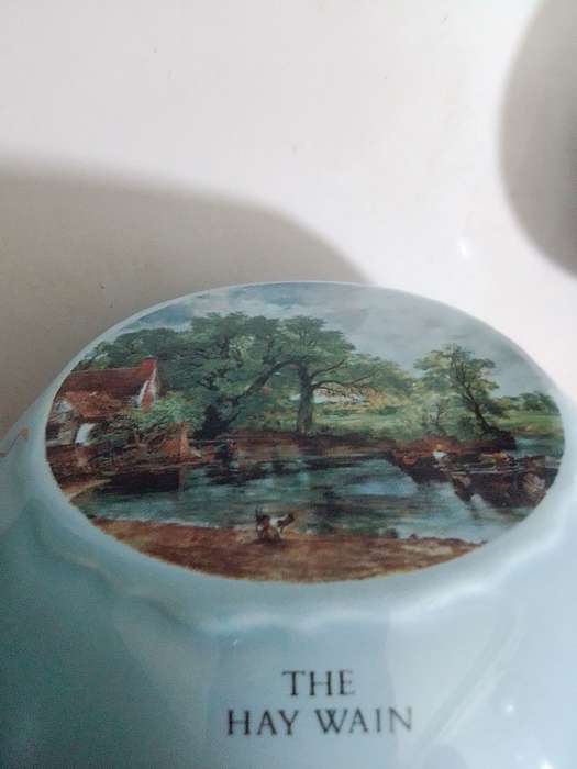 A Twinings Tea lidded canister + wood box with 3 partitions/clasp filled with 15 Cookie cutters.