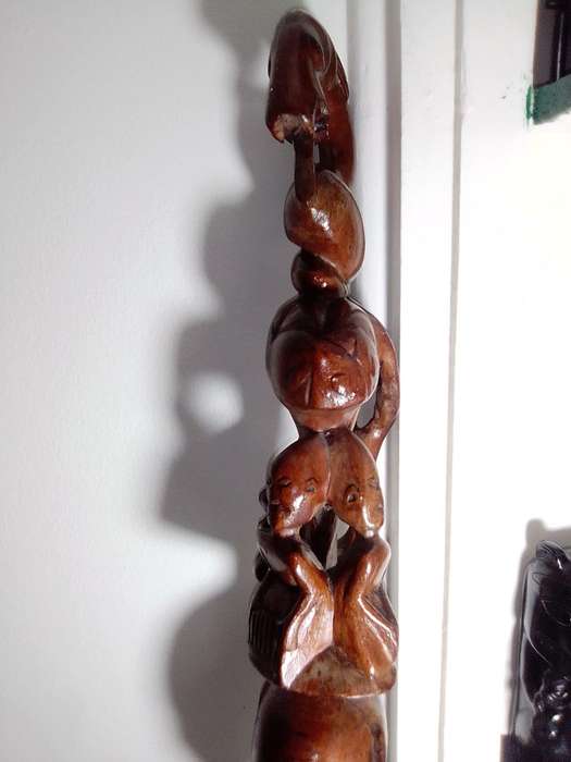 The Nyaminyami is described as having the body of a snake the head of a fish. Ethnic Walking Stick.