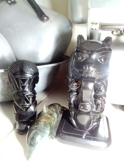 Tiki Idol god. Black Onyx obsidian Aztec carved statue Mayan stone. A black Onyx Dolfin & large Idol