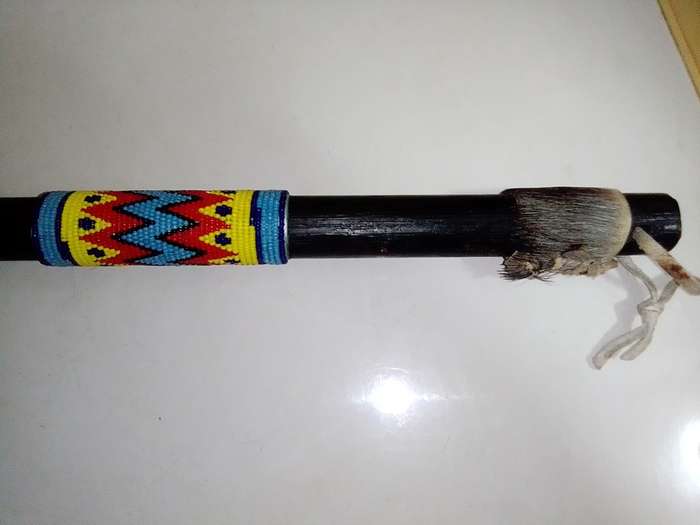Wow A Vintage Traditional African Throwing Axe with Blue/Red/Yellow/Black Beads and Buck skin.