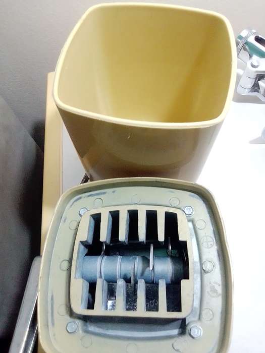 A manual working "Swing-A-Way" Ice crusher plus a table mounted Large wine bottle Cork puller.
