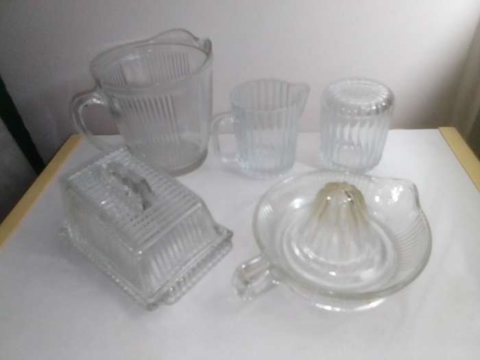For a couple.Vintage glass kitchen Glass sets. 2 Water Jugs, Lidded Jar, Butter Dish. Lemon Squeeze.