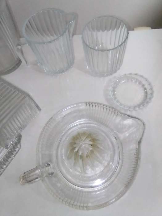 For a couple.Vintage glass kitchen Glass sets. 2 Water Jugs, Lidded Jar, Butter Dish. Lemon Squeeze.