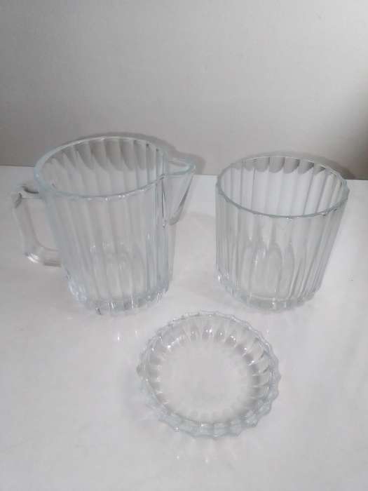 For a couple.Vintage glass kitchen Glass sets. 2 Water Jugs, Lidded Jar, Butter Dish. Lemon Squeeze.
