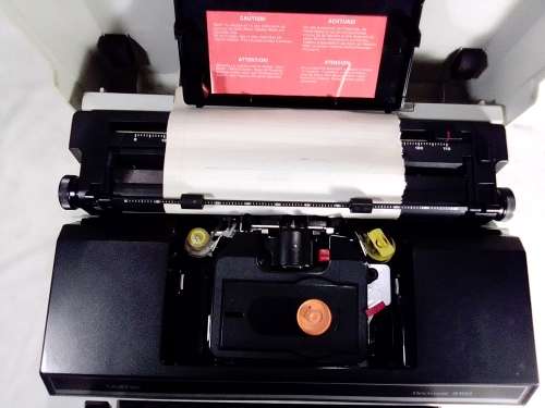 A Brother Typewriter in original case, In working condition.
