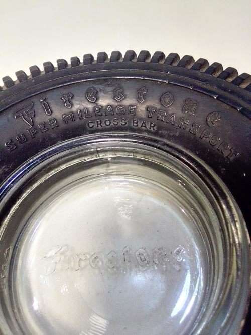 A Old Firestone tyre ashtray. In good condition for it`s age