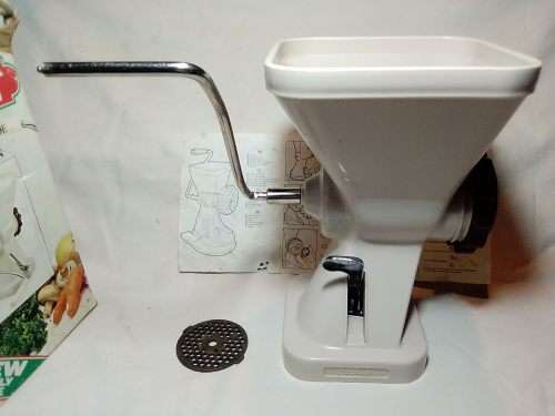In Good working order. Original box. Prestage Mincer made in ITALY. hand driven, table suction.