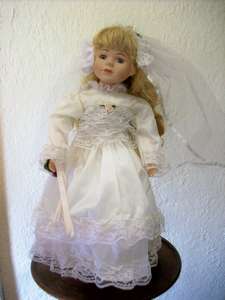 BEAUTIFUL DOLL DRESSED AS A BRIDE - ON STAND.